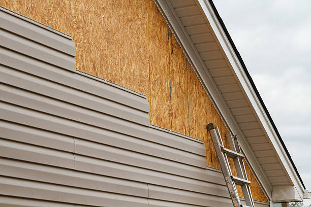 Professional Emergency Siding Repair technician working in New Manchester, WV